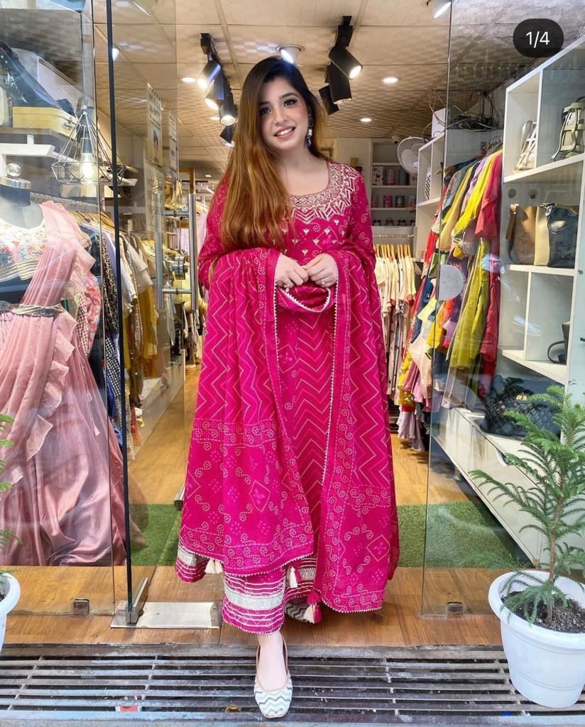 Bright pink cotton kurti for women with intricate embroidery, perfect for festive occasions