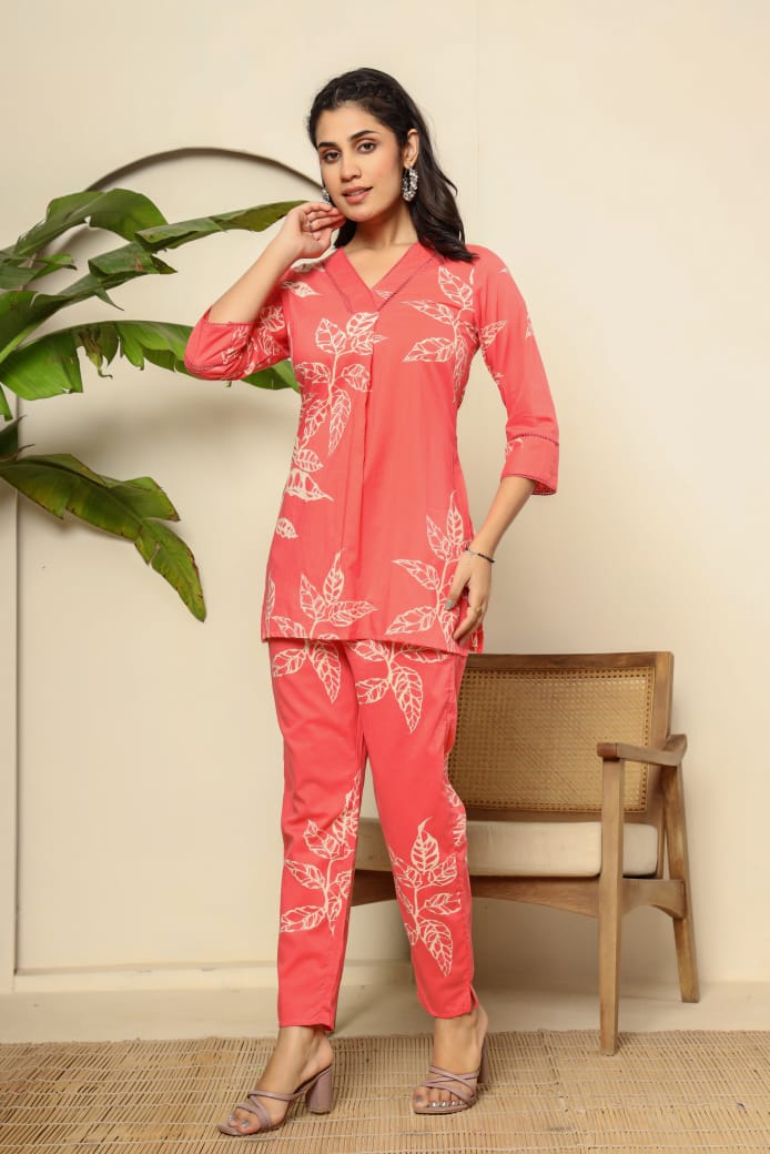 Stylish women's co-ord set in coral with leaf print, perfect for casual outings or events